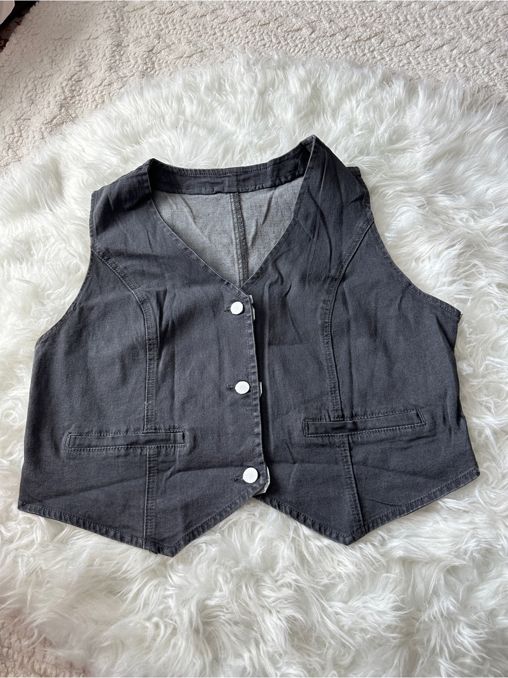 washed grey denim vest with button-up front and pockets